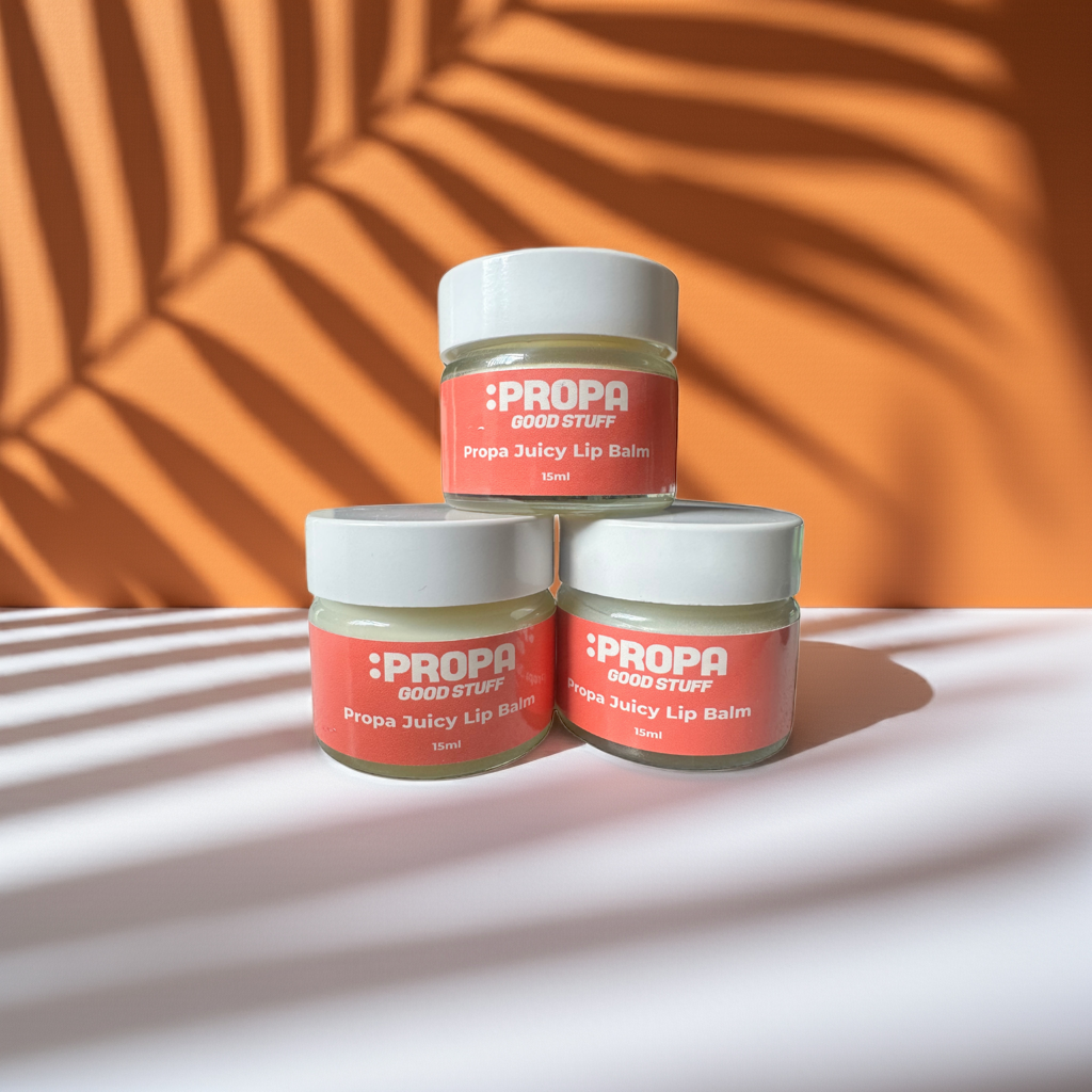 Propa Juicy lip balm with cocoa & shea butters, avocado & jojoba oils for soft, smooth lips. Scented with sweet orange - Propa Good Stuff