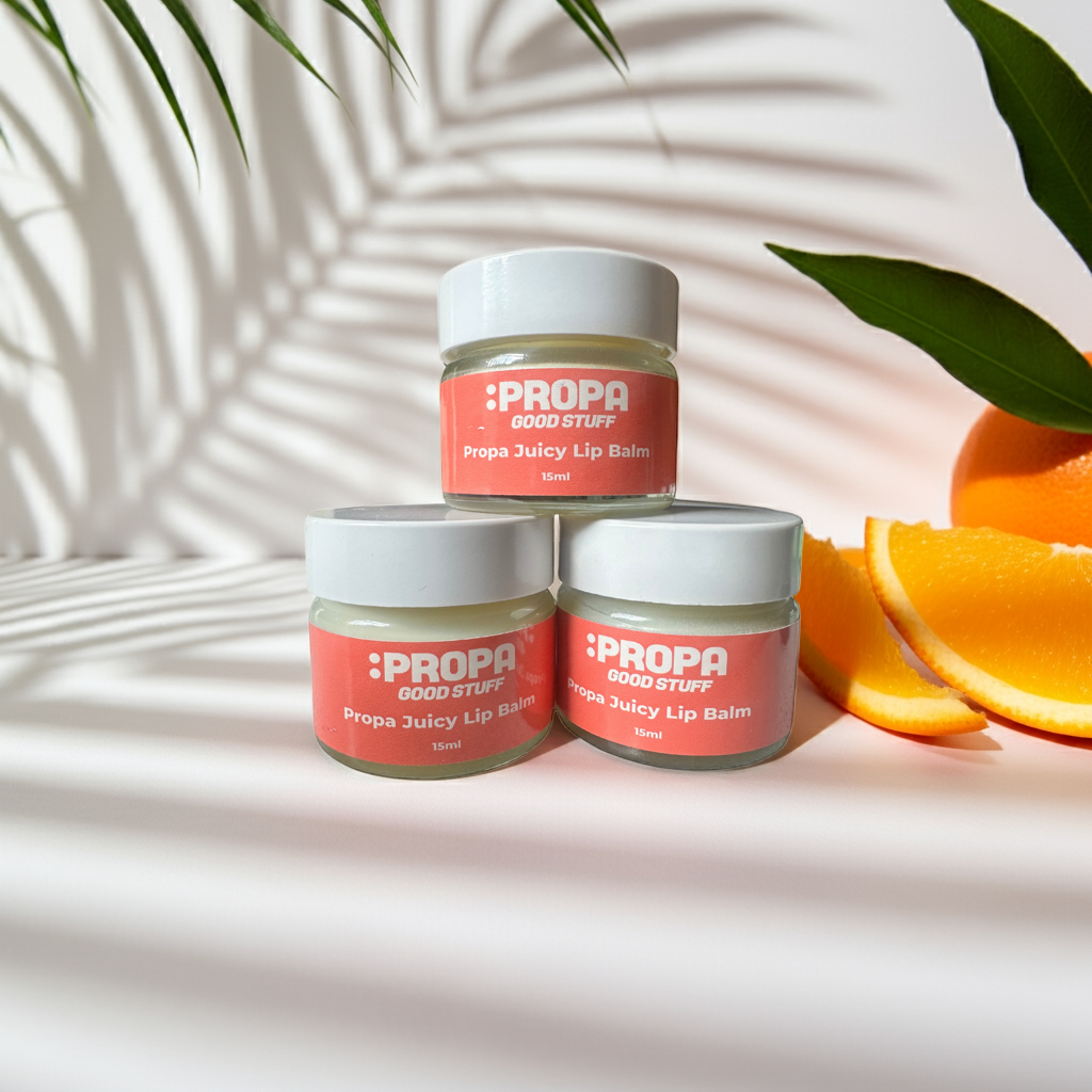 Propa Juicy lip balm with cocoa & shea butters, avocado & jojoba oils for soft, smooth lips. Scented with sweet orange - Propa Good Stuff